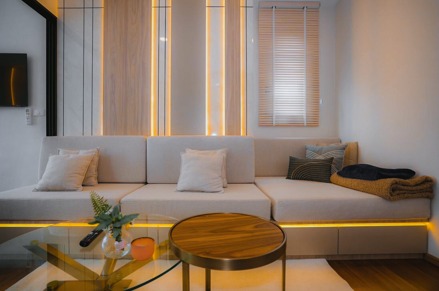 Condominium Interior living room design with custom built-in furniture and by Sketchbook Studio